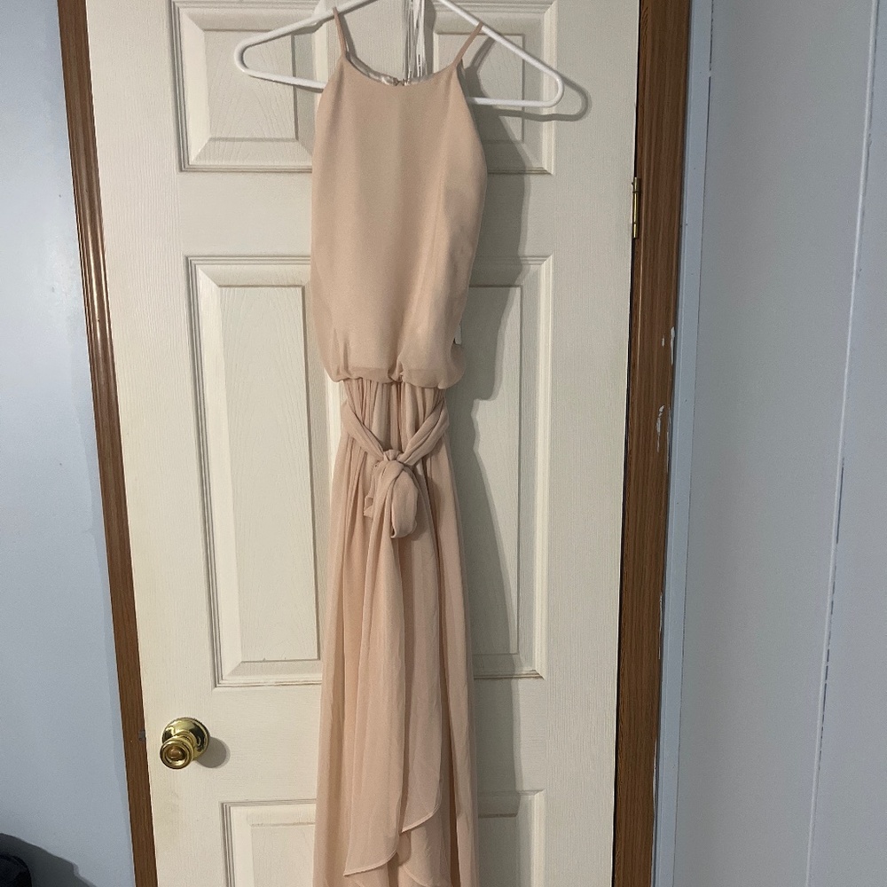 Floor length bridesmaid’s dress.